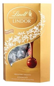 Конфеты Lindor (Линдор) ТМ Lindt (Линдт) из молочного шоколада с нежной, тающей начинкой